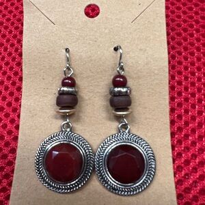 Red beaded dangle earrings.